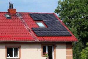 A house with solar panels installed on its roof, showcasing an efficient residential solar system designed for sustainable energy generation.