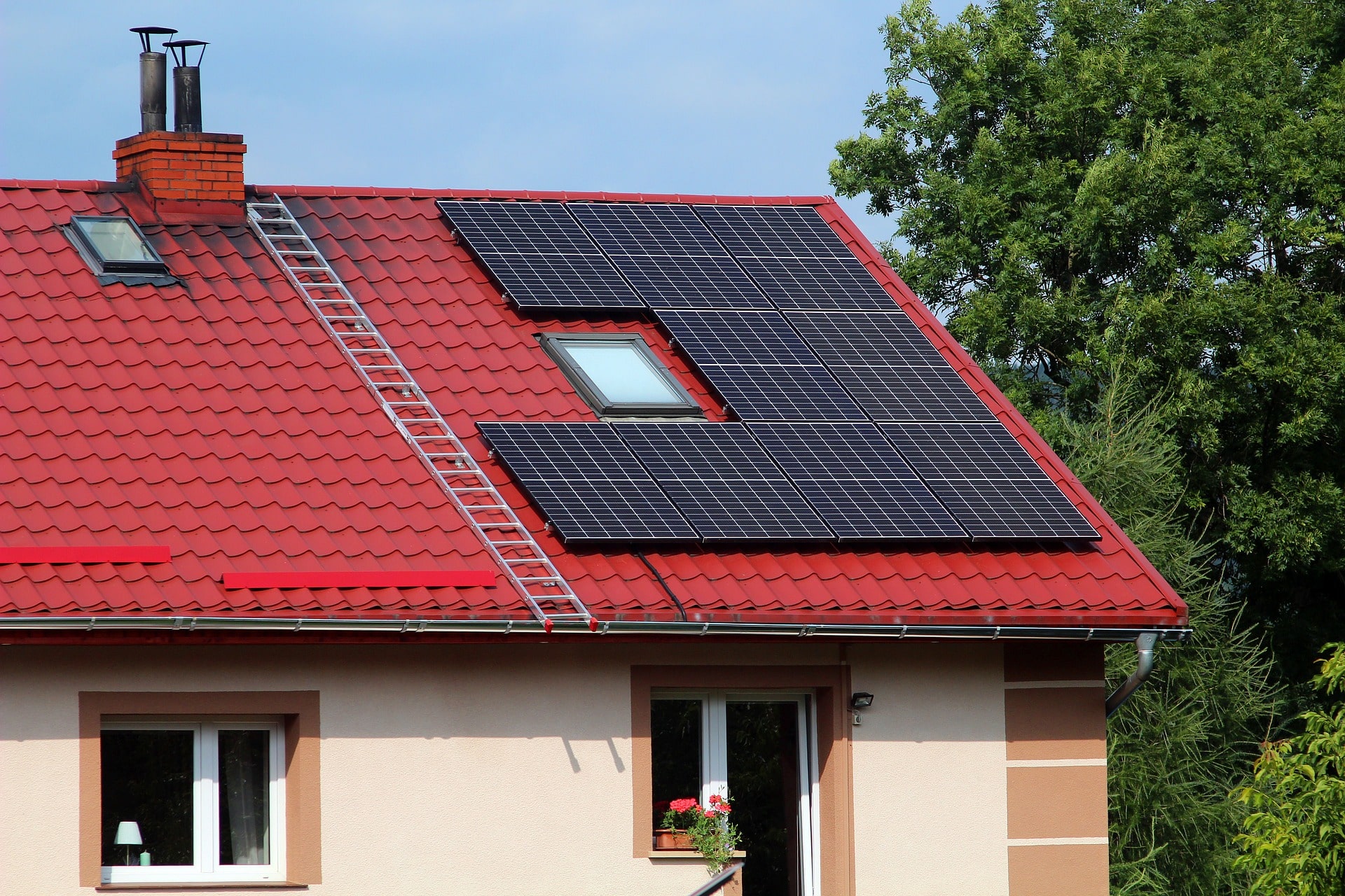 A house with solar panels installed on its roof, showcasing an efficient residential solar system designed for sustainable energy generation.