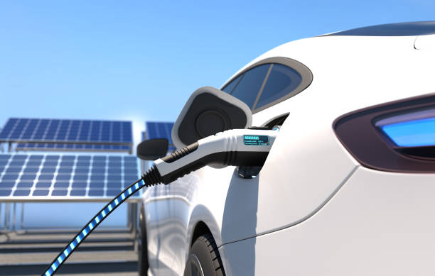 An electric car charging at a station powered by solar panels, showcasing the integration of renewable energy and a sustainable solar system. 